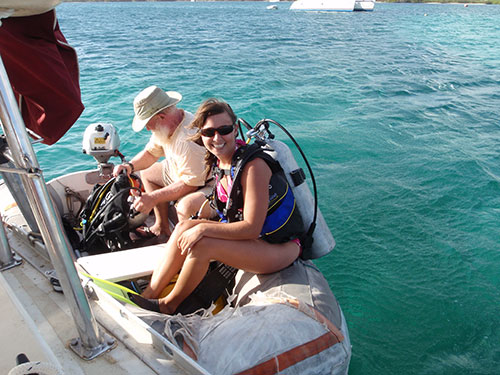 Lara does confined water exercises with John